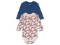 Baby-onesie met bloemenprint en een effen blauw T-shirt van Topita.