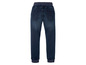 Een paar blauwe jeans met elastische tailleband.