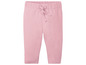 Roze baby leggings met koordje.