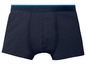 Een paar donkerblauwe boxershorts met een blauwe tailleband.