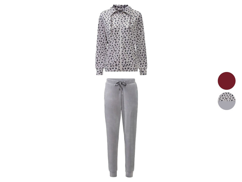 Een joggingpak met een trui met luipaardprint en grijze broek.