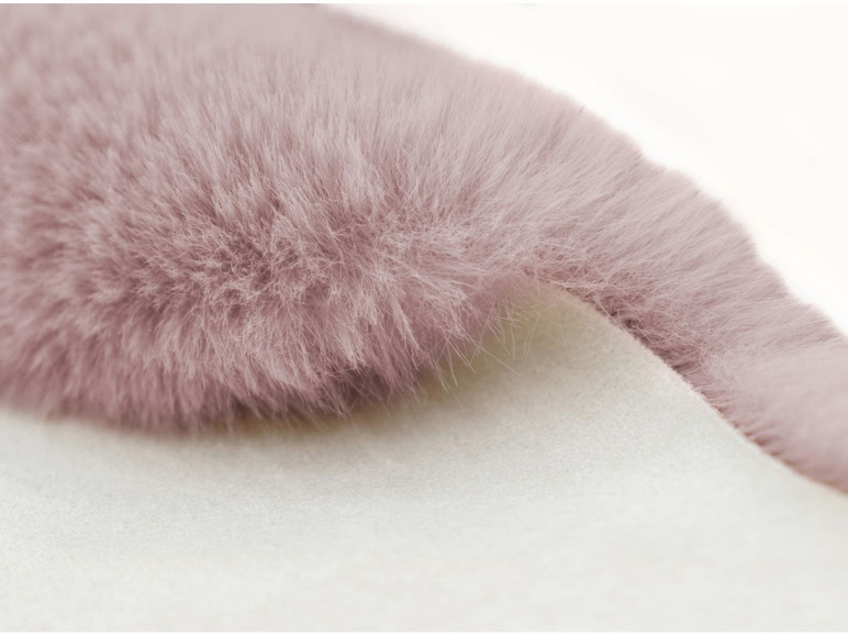 Close-up van roze pluche stof.
