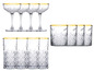 Vier cocktailglazen en vier hoge glazen met gouden rand.