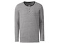 Een grijs langarm shirt met knopen