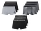 Zes boxershorts van Westdept, in grijs, zwart met strepen en zwart met stippen.