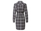 Zwart-wit geblokt shirtjurk met lange mouwen.