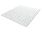 Een wit matras met een golvend patroon.