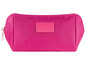 Een roze toilettas met een rits.