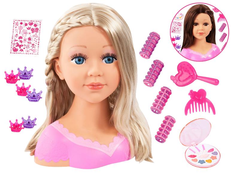 Blonde stylingkop met make-up, haarrollers, kam, borstel, kroonklemmen en stickers.