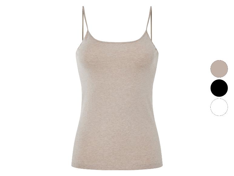 Beige tanktop met spaghettibandjes, verkrijgbaar in verschillende kleuren.