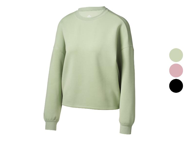 Crivit dames sweatshirt lichtgroen met ronde hals en kleurstalen.