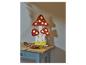 Houten lamp in de vorm van paddenstoelen met LED-verlichting, op een tafel.