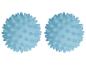 Twee blauwe massageballen met spikes.