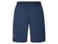 Donkerblauwe sportbroek met witte details.