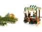 Kerstboomverkoopkraam met miniatuurfiguren, bomen en een prijslijst, naast een glittergouden ornament en dennentak.