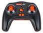 Zwarte Carrera RC afstandsbediening met oranje knoppen en joysticks.