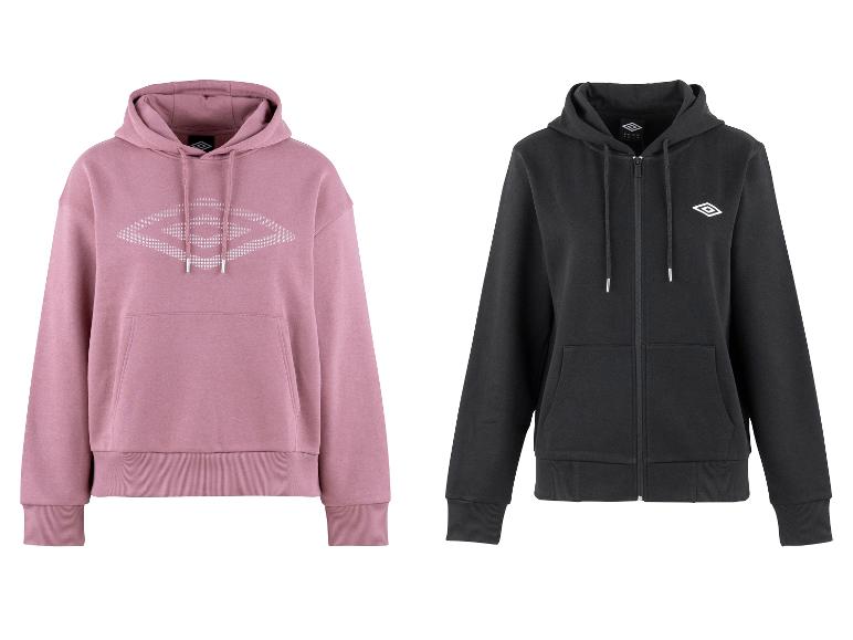 Twee hoodies, één roze pullover met een groot ruitpatroon en één zwarte met rits.