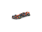 Een oranje-zwarte raceauto met gekleurde banden en sponsoring.