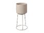 Beige bloempot met metalen standaard
