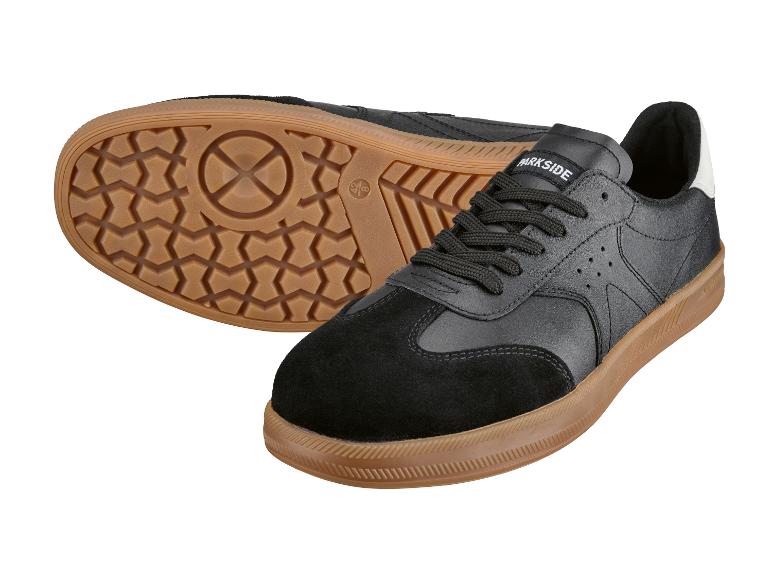Zwarte herensneakers met een rubberen zool en suède details.