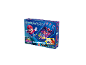 Een Super Mario Galaxy flipperkastspel met Mario op de doos, met waarschuwing voor kleine onderdelen.