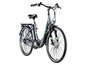 Een zwarte elektrische fiets met groene accenten.