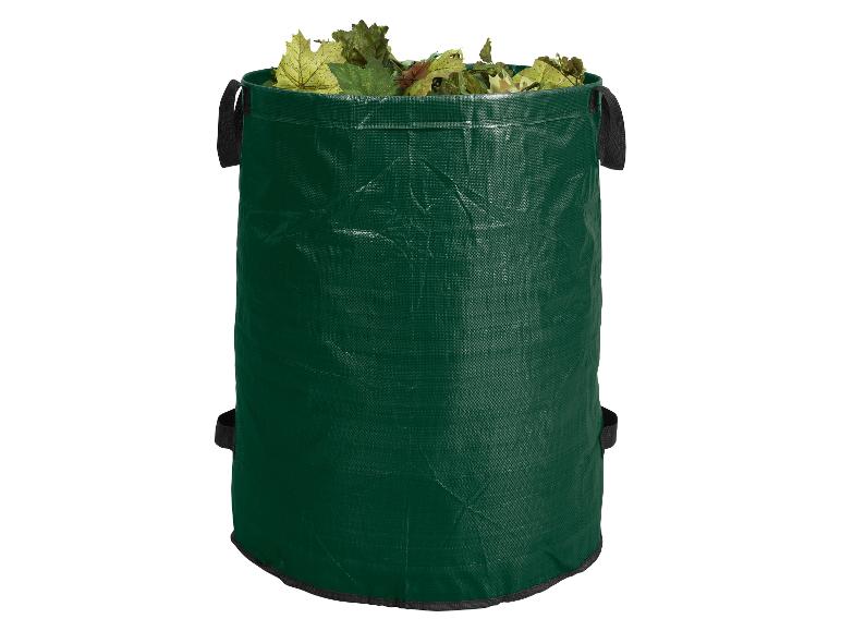 Groene tuinzak voor bladeren, gevuld met herfstbladeren