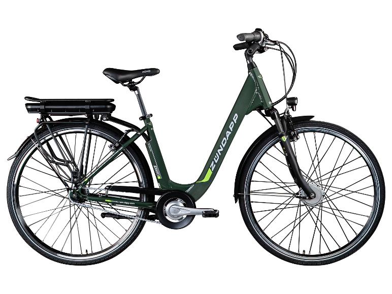 Een groene Zundapp elektrische fiets met bagagedrager en voorlicht.