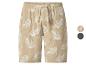 Beige linnen shorts met witte bladprint en verstelbaar trekkoord.