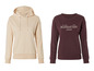 Een beige hoodie en een bordeauxrood sweatshirt met de tekst 'New York City Manhattan Island'.