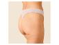 Vrouw in beige high-waist string, zijaanzicht.