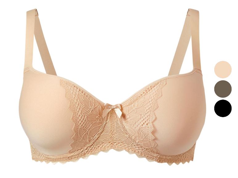Vrouwelijke lingerie: beige kanten bh.