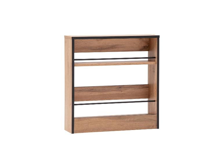 Houten plank met zwarte details, voorzien van vier open vakken.