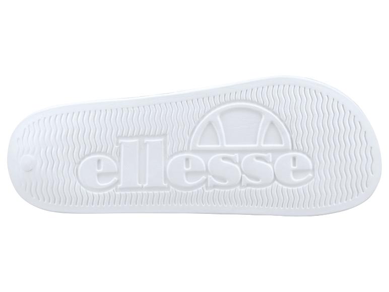Witte sandaalzool met reliëflogo en golfpatroon.