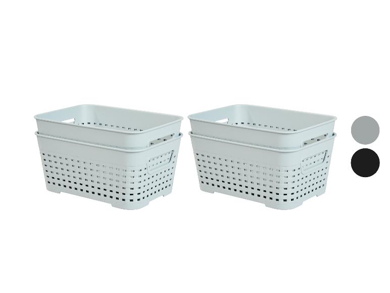 Twee sets lichtgrijze en donkergrijze plastic opbergmanden.