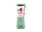 Mintgroene blender met bessen en yoghurt.