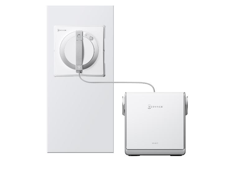 Een Ecovacs Winbot raamreinigingsrobot aangesloten op zijn oplaadstation.