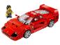 Een rode Lego Ferrari F40 met een minifiguur.