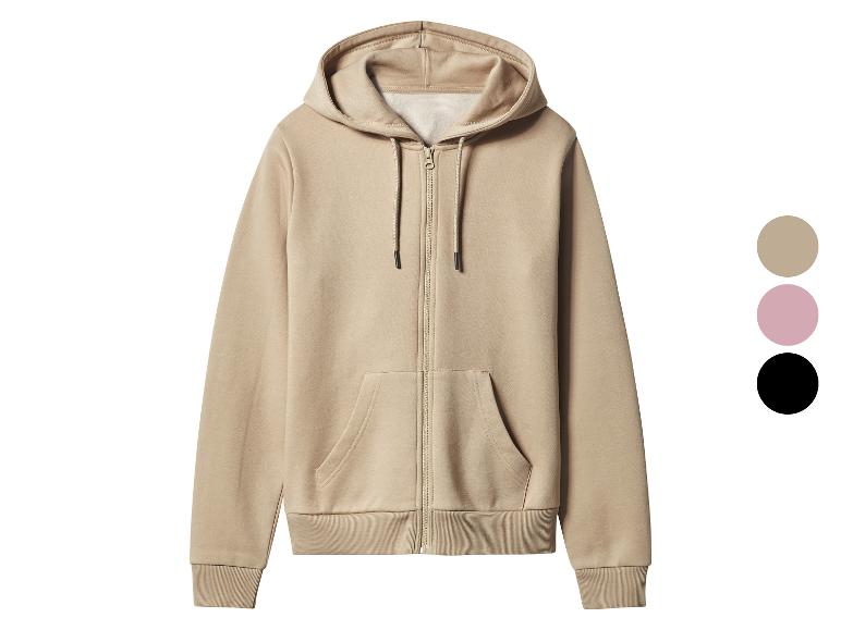 Beige hoodie met rits, voorzakken en elastische manchetten.