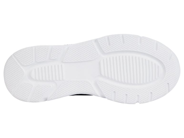 Witte sneakers, onderkant.