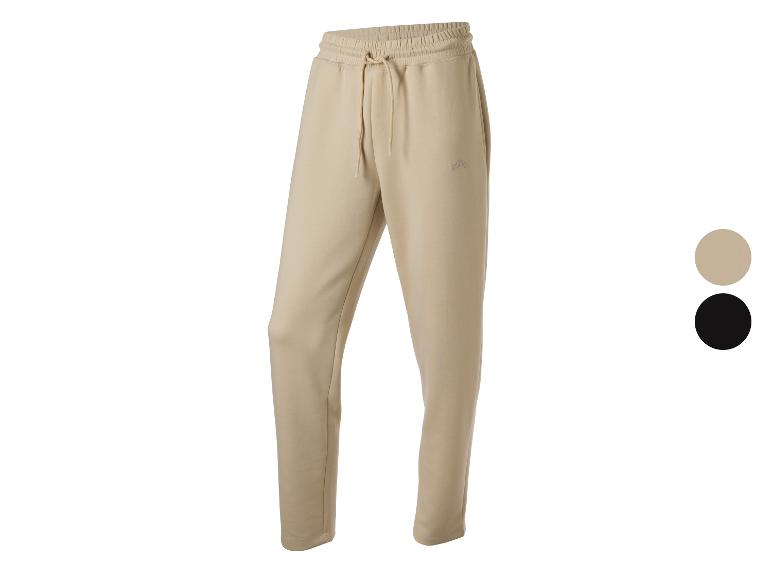 Beige joggingbroek met elastische tailleband en trekkoord, met klein logo op de dij.