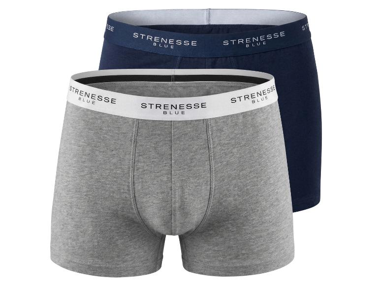 Set van twee herenboxershorts, één grijs en één marineblauw, met elastische taillebanden.