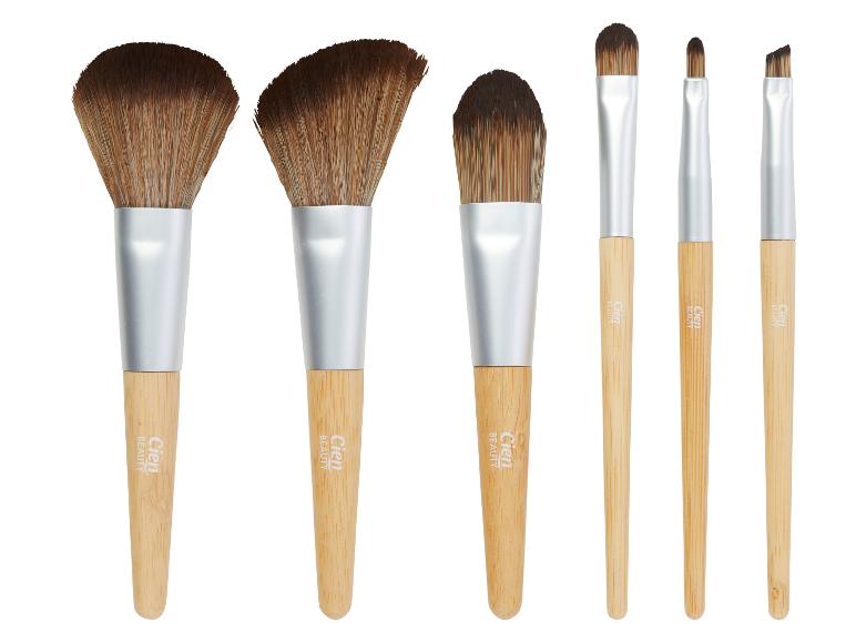 Een set van zes Cien Beauty make-upkwasten met houten handvatten.