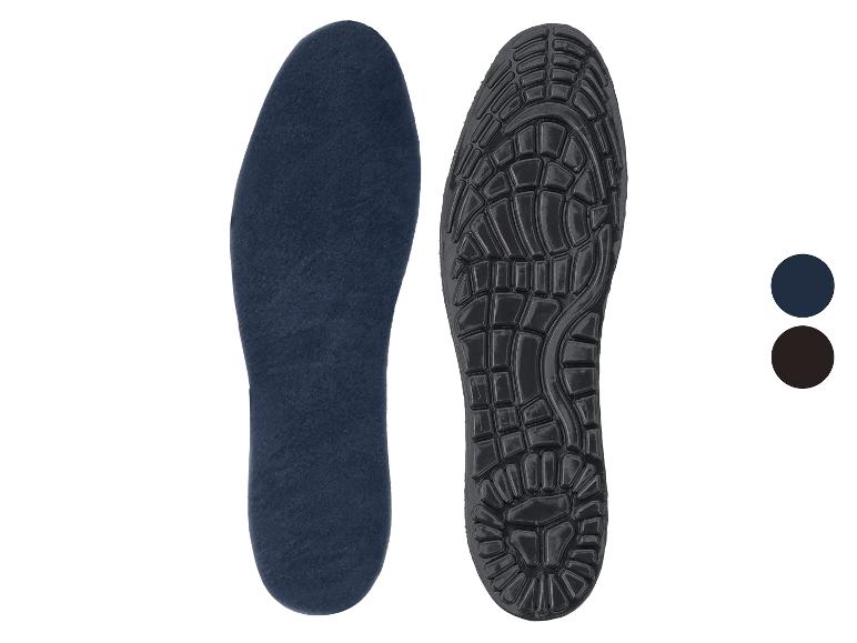 Twee inlegzolen, één donkerblauw en één zwart met een patroon aan de onderkant