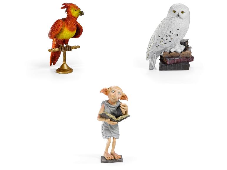 Drie Schleich-figuren van magische wezens: Felix, Hedwig en Dobby.