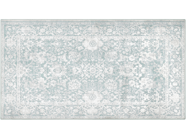 Rechthoekig vloerkleed met abstract bloemenpatroon en decoratieve rand, in blauwe en witte tinten.