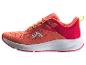 Dames sportschoenen in oranje en rode tinten met limoengroene details