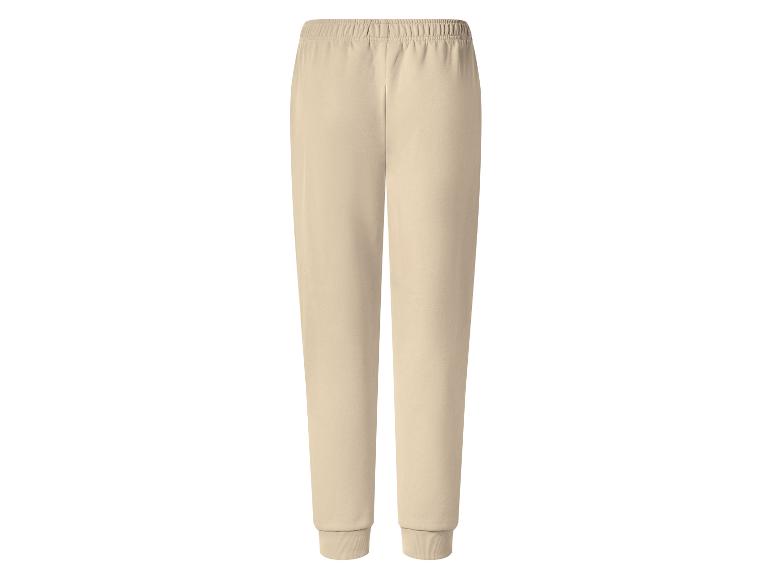 Beige joggingbroek met elastische tailleband en geribde boorden.