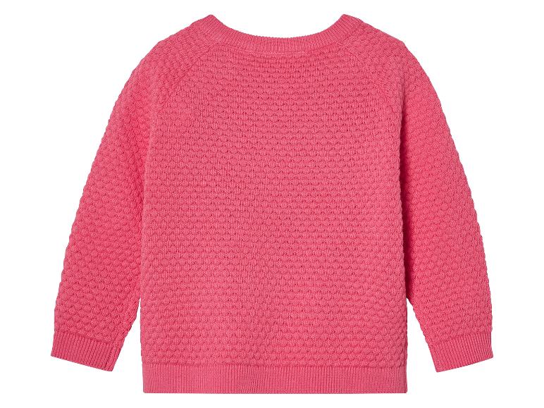 Roze gebreide trui voor baby's, met textuur gebreid.