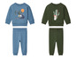 Twee babysets met lange mouwen, een blauwe met een print van een camper en cactussen en een groene met een konijn en een cactus